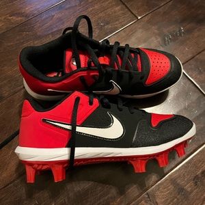 Nike youth size 4Y boys baseball cleats. Brand new never worn.